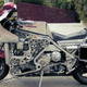 Illustration for article titled A Wonderful Crazy Genius Crammed A Ferrari V8 Into A Custom Motorcycle